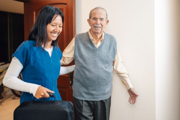 Positive Impact Care Staff Supporting Client